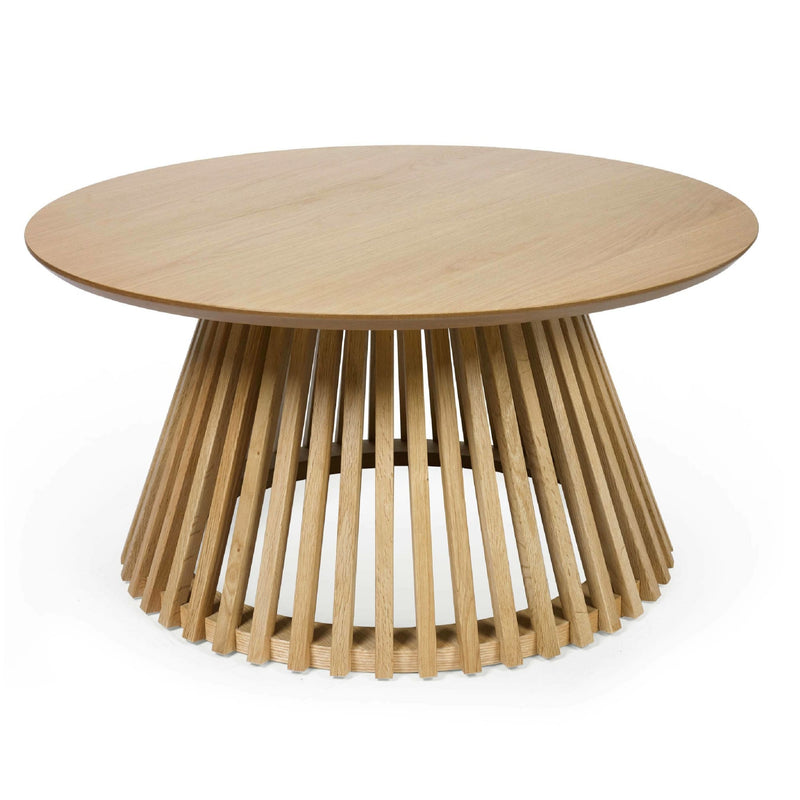 Wooden round table with a unique base design on a white background