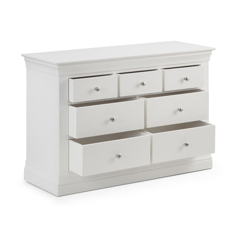 White dresser with multiple drawers on a white background