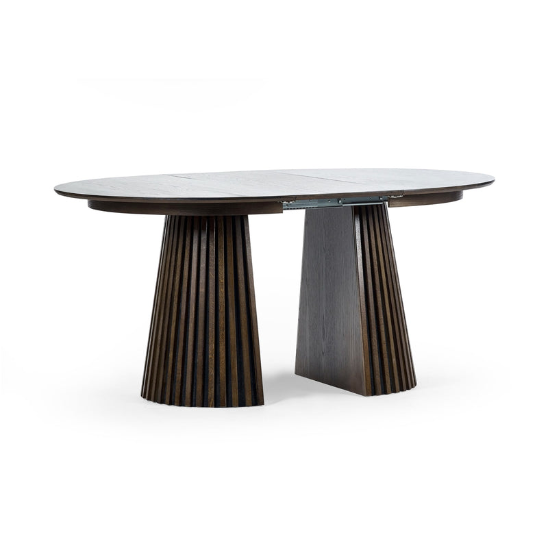 Modern dining table with unique cylindrical legs on a white background