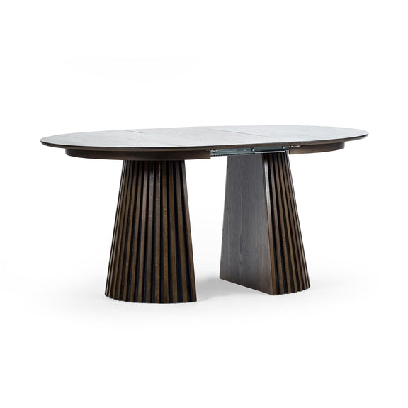Modern dining table with unique cylindrical legs on a white background