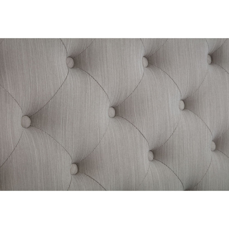 Textured gray headboard with tufted design