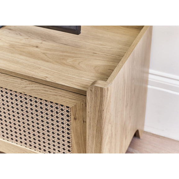 Wooden side table with wicker patterned drawer