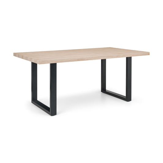Table with wooden top and black metal legs on a white background