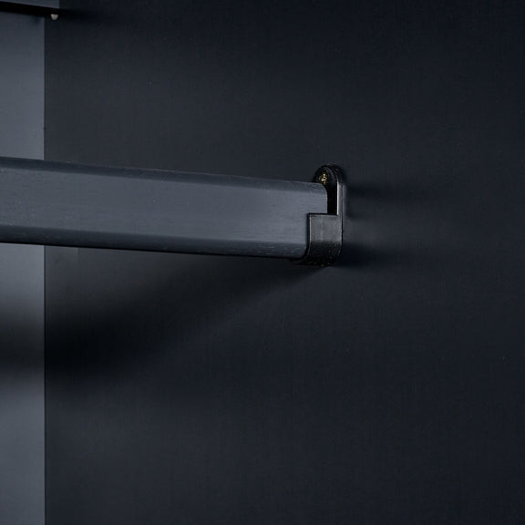 Black metal bracket on a dark background