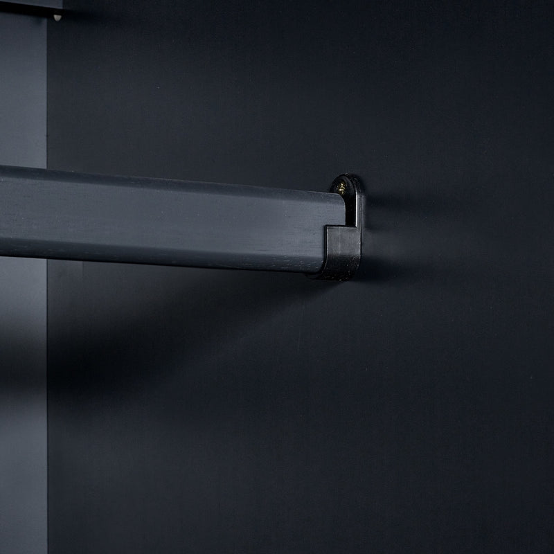 Black metal bracket on a dark background