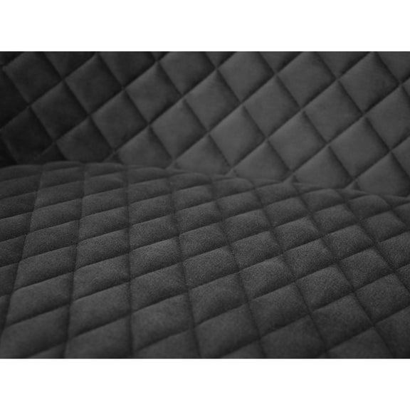 Close-up of black quilted fabric with a diamond pattern