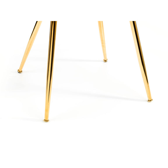 Gold earrings on a white background