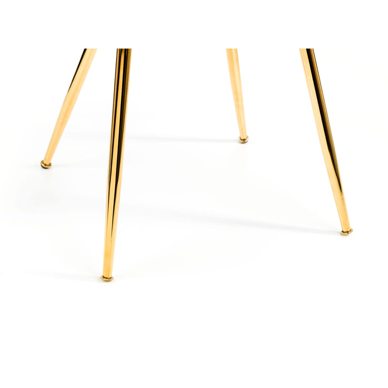 Gold earrings on a white background