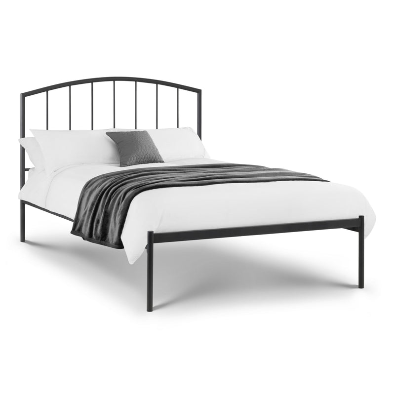 Black metal bed frame with white bedding and gray blanket on a white background
