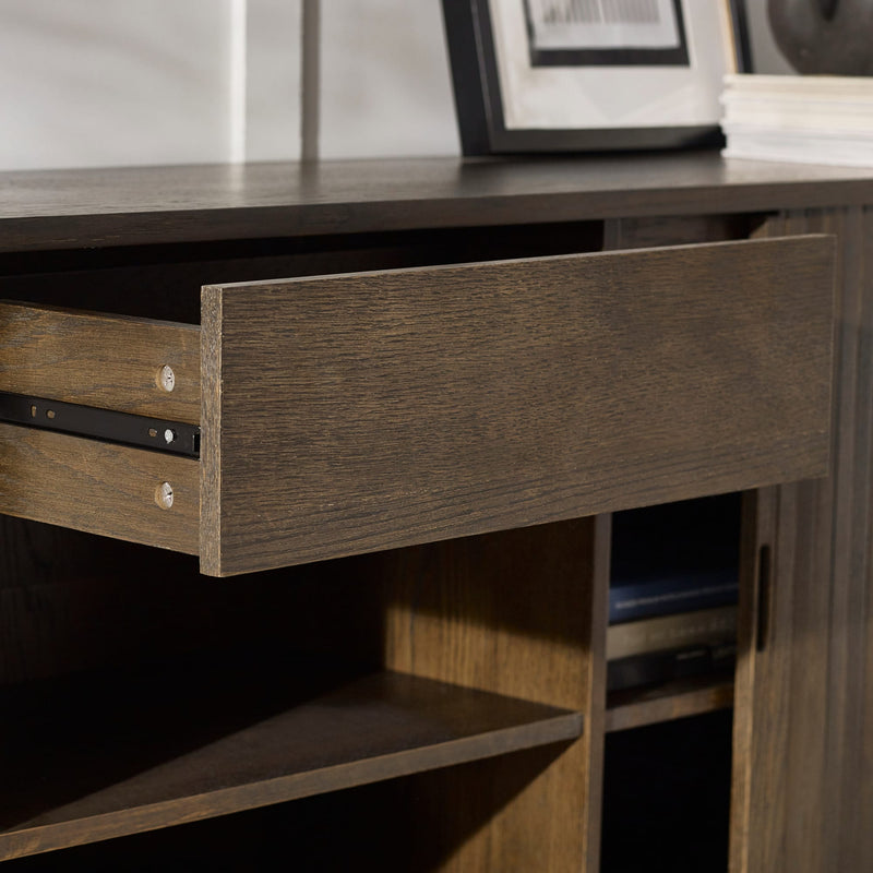 Wooden drawer of a piece of furniture with a shelf below