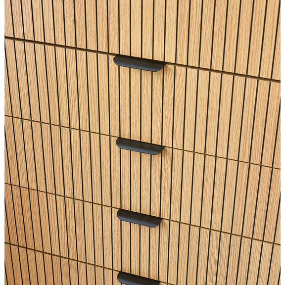 Wooden cabinet with black handles on a white background