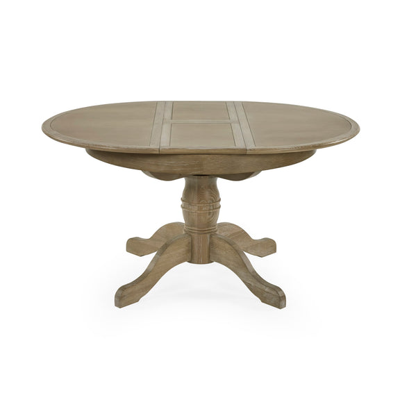 Round wooden dining table with a pedestal base on a white background