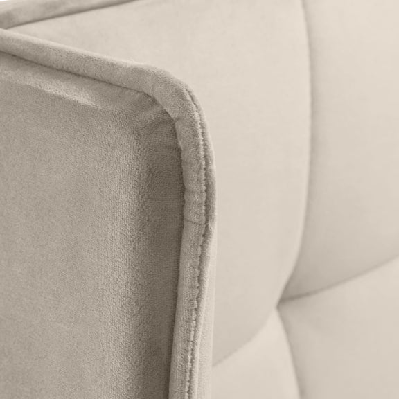 Close-up of a textured fabric surface in beige color