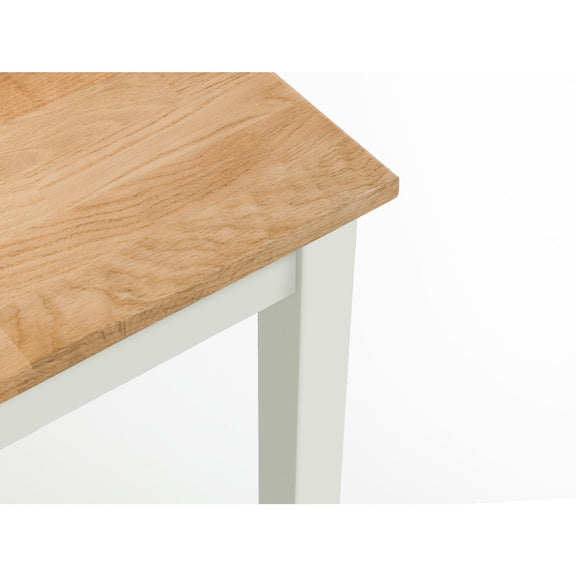 Wooden table top with white legs on a white background
