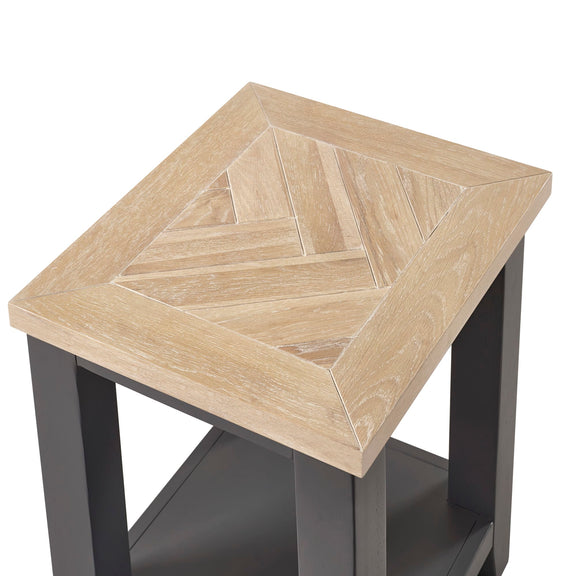Small side table with a geometric patterned top on a white background