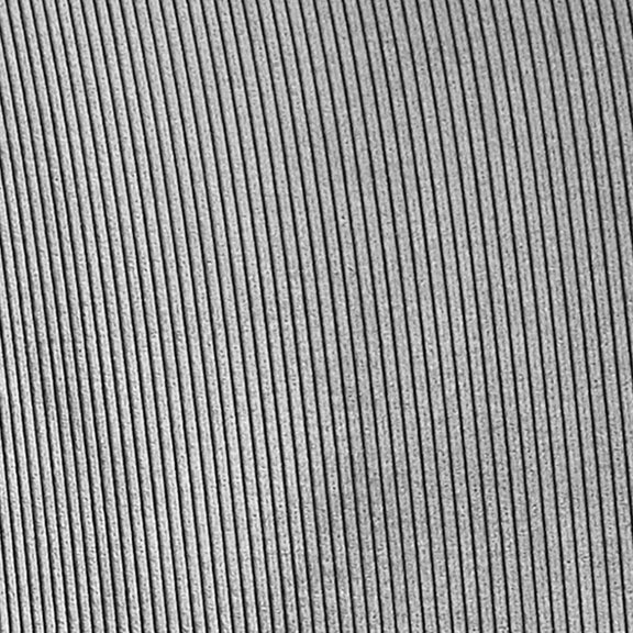 Close-up of a textured gray surface with parallel lines