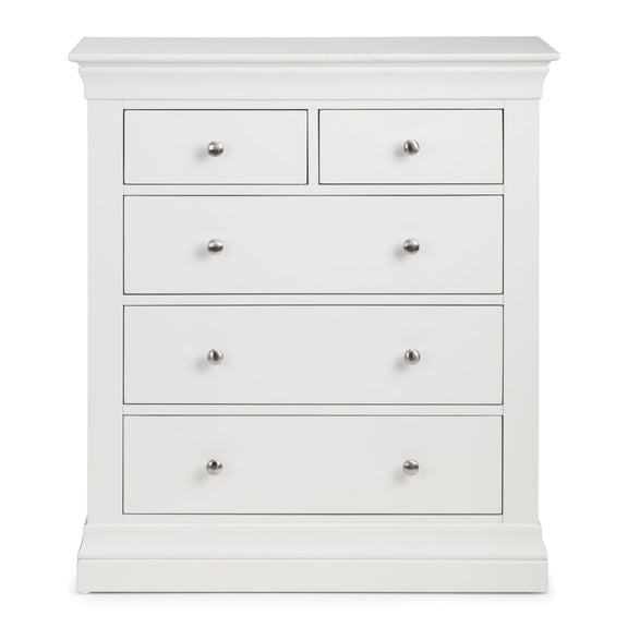 White dresser with four drawers on a white background