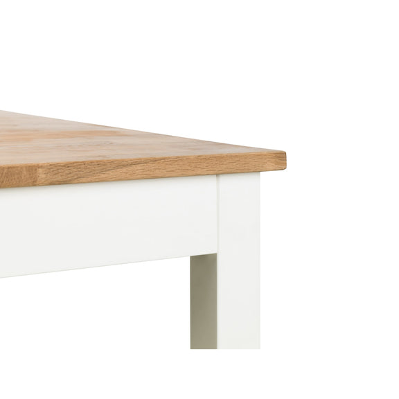 Close-up of a wooden table top on a white background