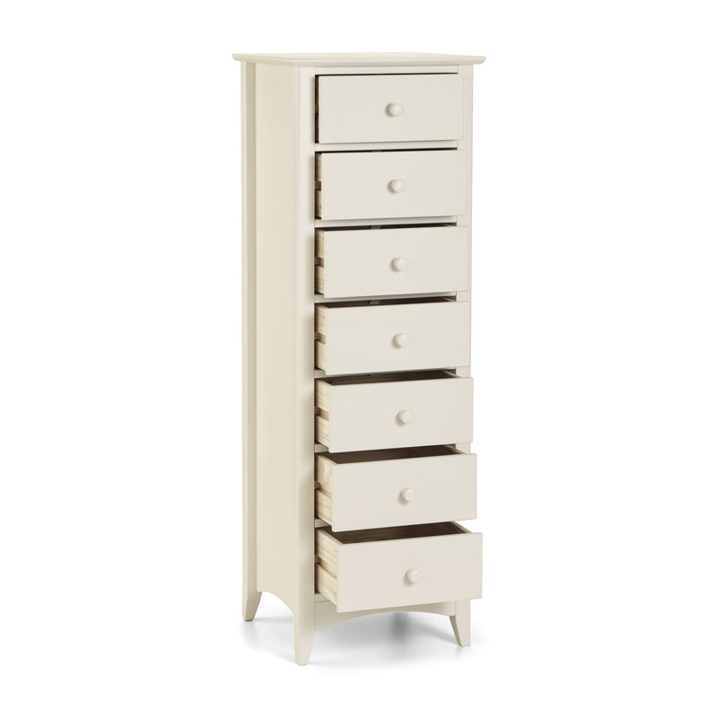 White tall dresser with multiple drawers on a white background