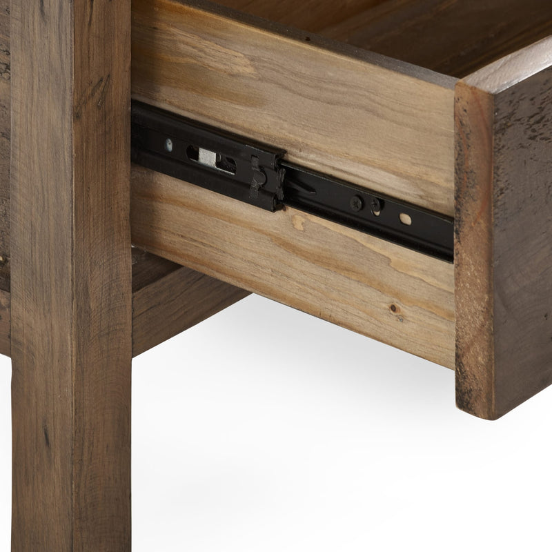 Wooden drawer with a black metal slide on a white background