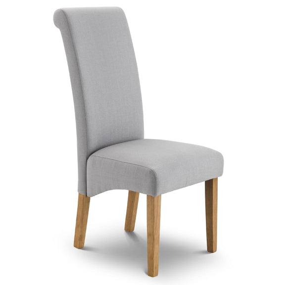 Gray upholstered chair with wooden legs on a white background
