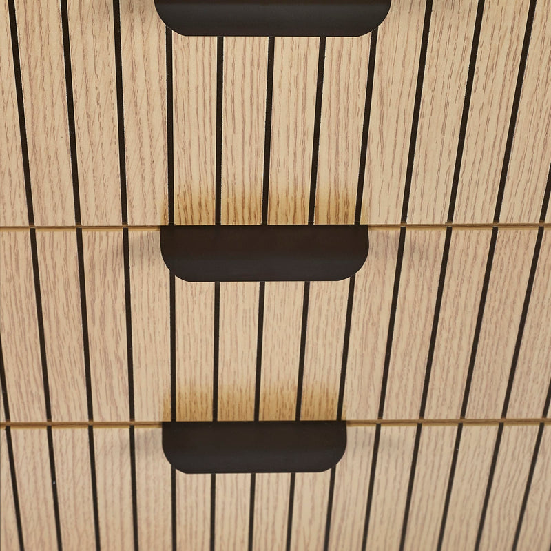 Close-up of black metal brackets on a wooden panel with horizontal slats.