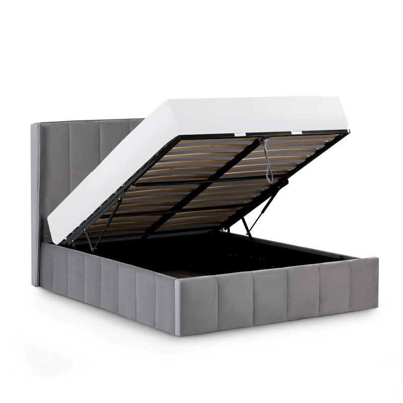 Gray upholstered bed with open headboard showing wooden slats on a white background