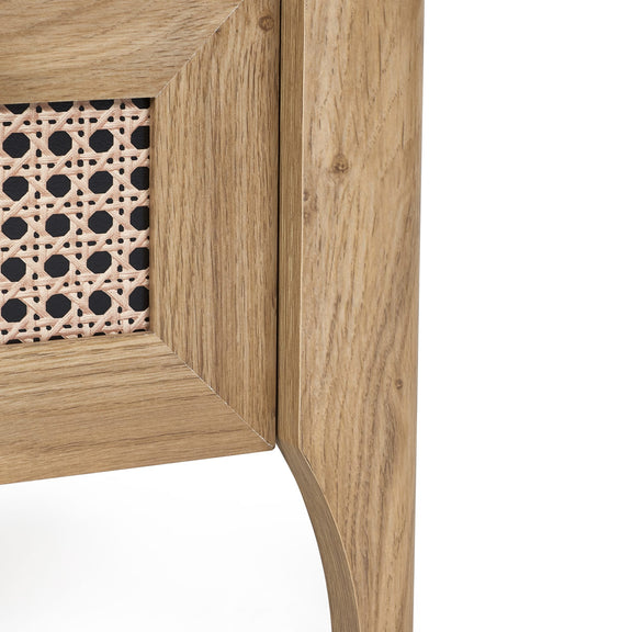 Close-up of oak bedside table side panel and tapered leg