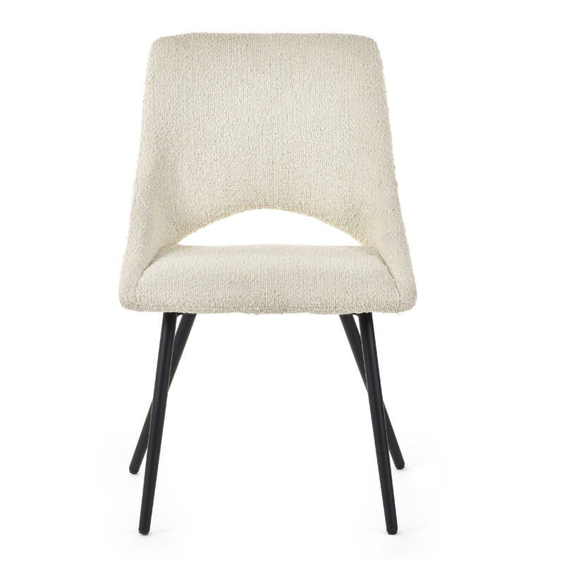 Beige upholstered chair with black legs on a white background