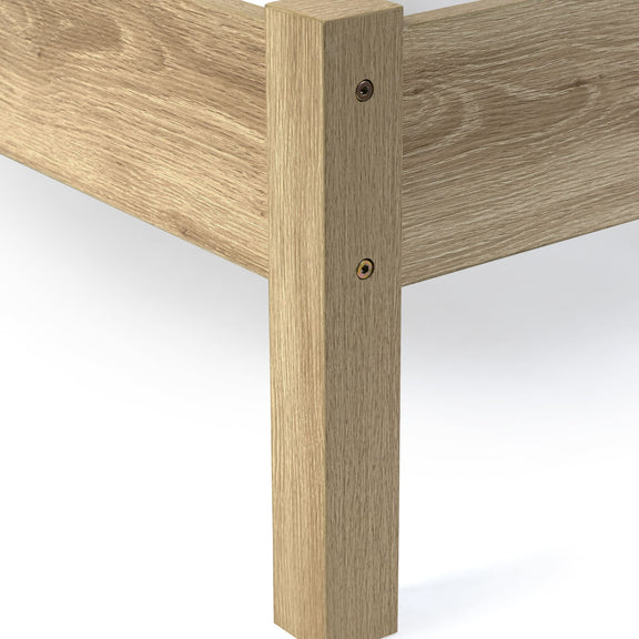 Close-up of a wooden furniture corner with a white background
