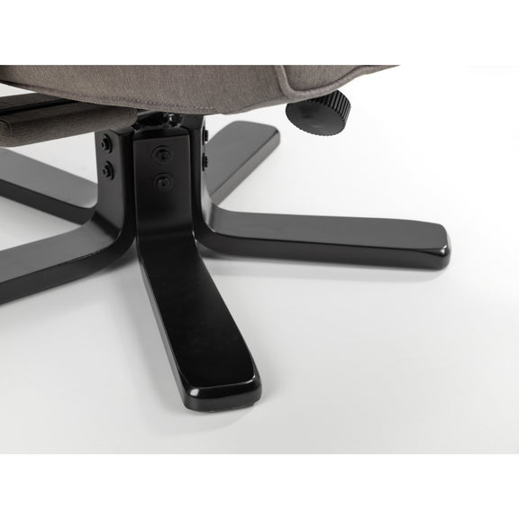 Close-up of a chair's black metal base on a white background