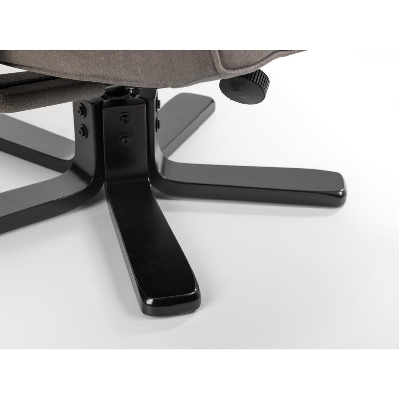 Close-up of a chair's black metal base on a white background