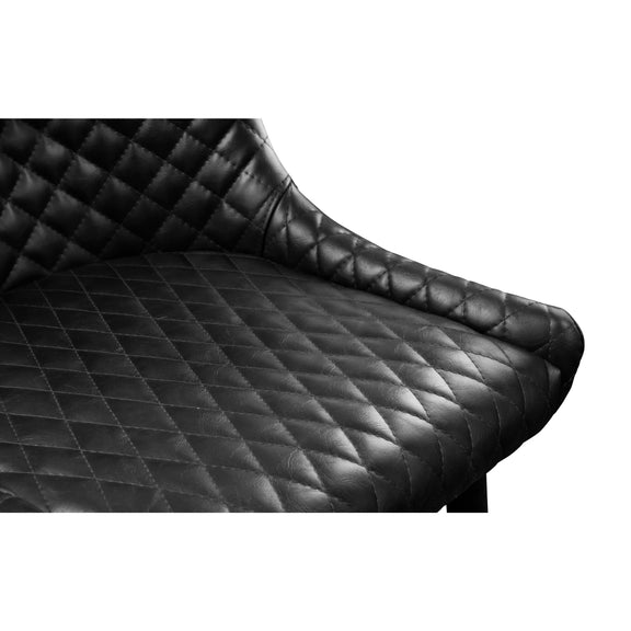 Black quilted leather seat cover on a white background