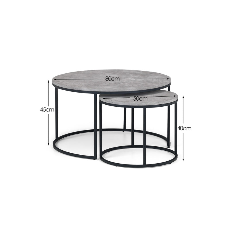 Set of two round tables with dimensions indicated on a white background