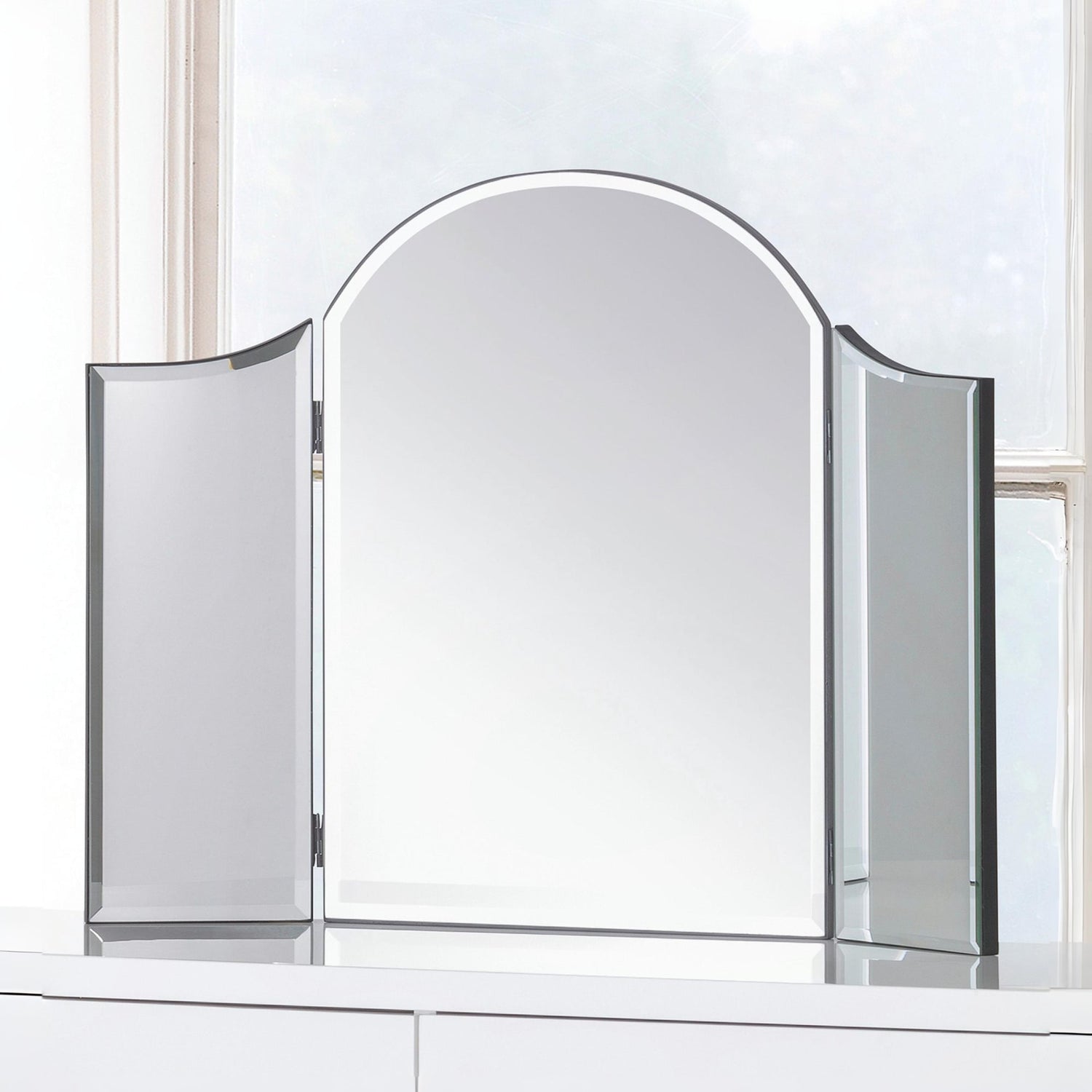 Tri-fold makeup mirror with a white background