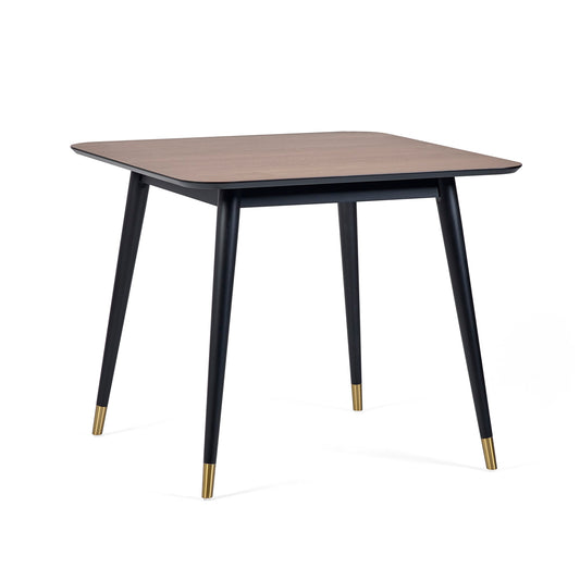 Square table with wooden top and black legs on a white background