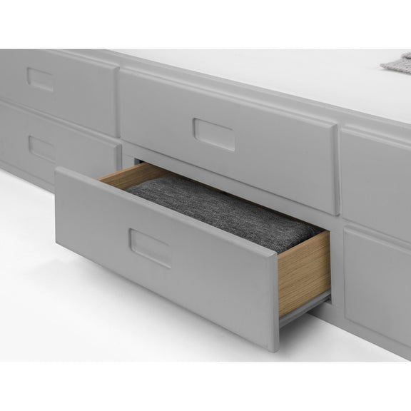 Gray drawer with wooden bottom and gray felt liner on a white background
