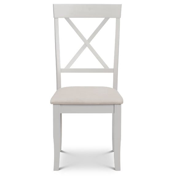 White wooden chair with a cream cushion on a white background