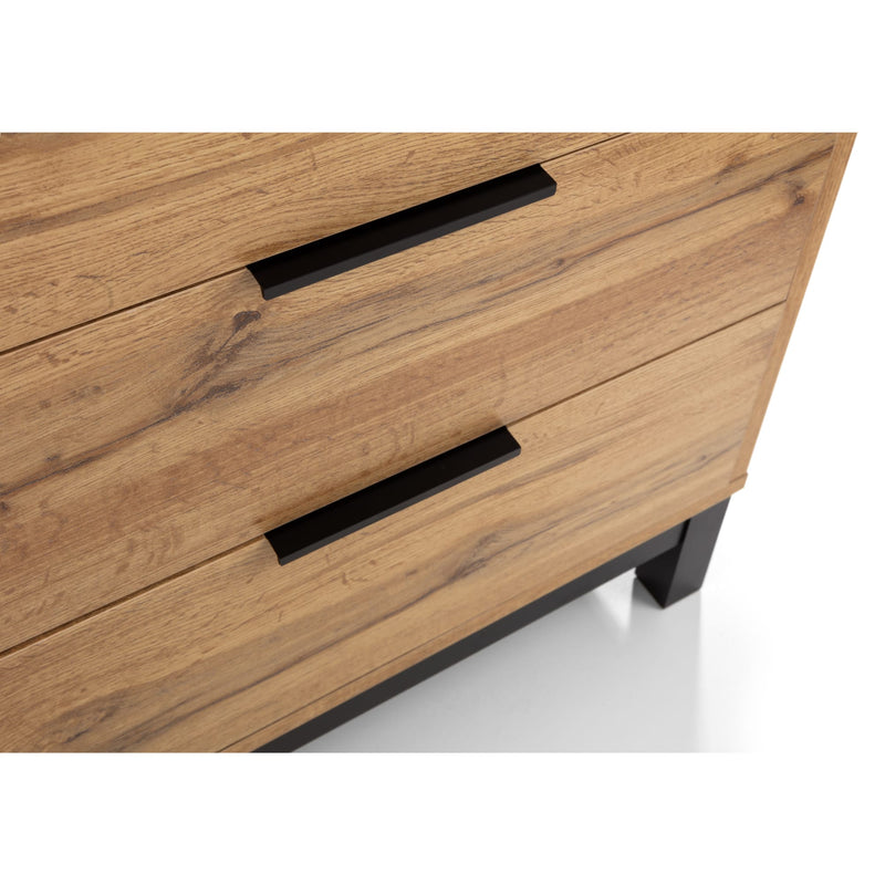 Wooden dresser with black handles on a white background