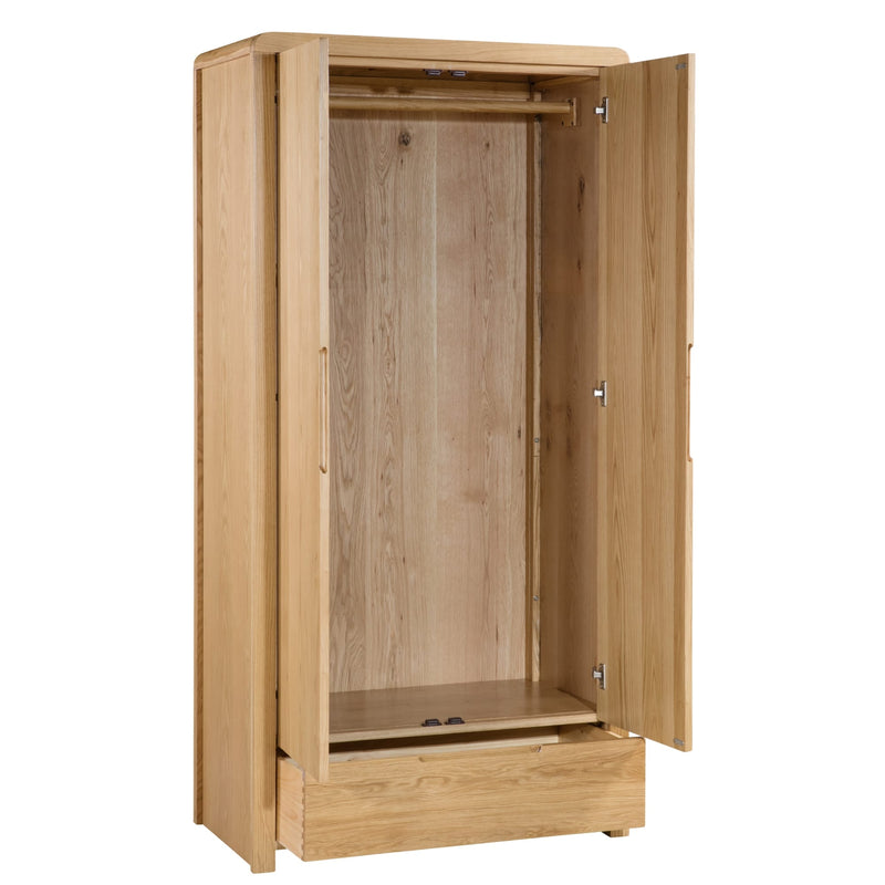 Wooden wardrobe with open doors on a white background