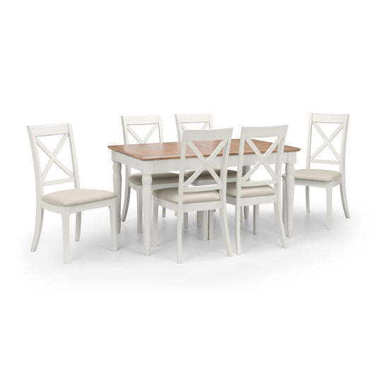 Dining table set with six chairs on a white background
