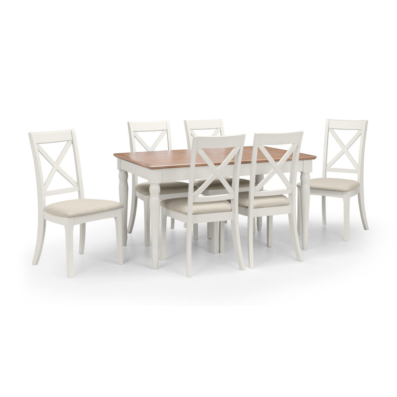 Dining table set with six chairs on a white background