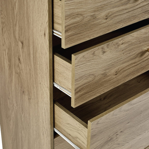 Wooden dresser with multiple drawers in a light finish