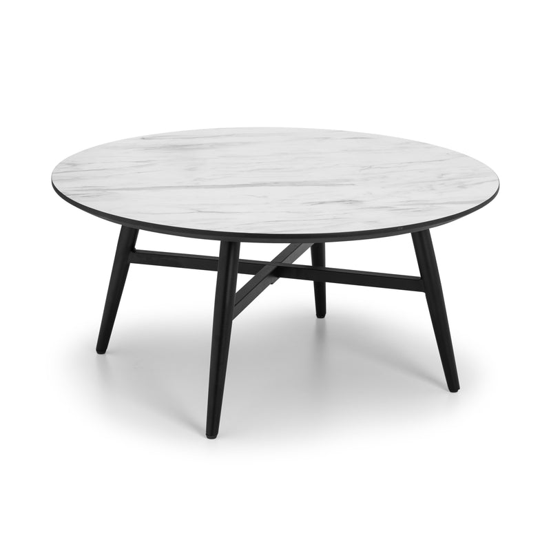 Round coffee table with marble top and black legs on a white background