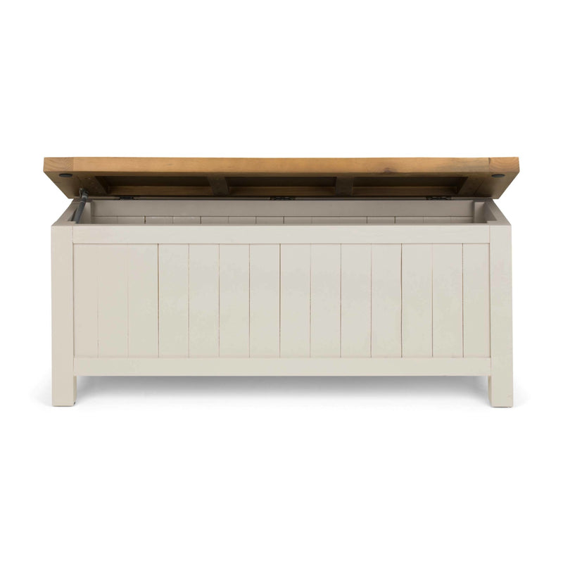 White storage bench with a wooden top on a white background