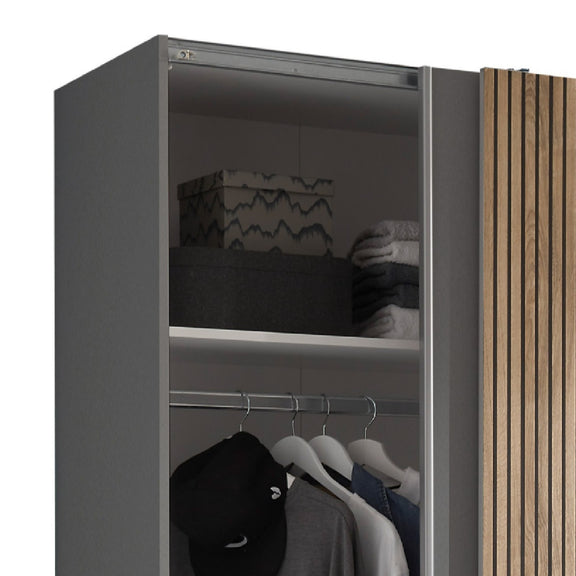 Gray wardrobe with clothes and hangers on a white background