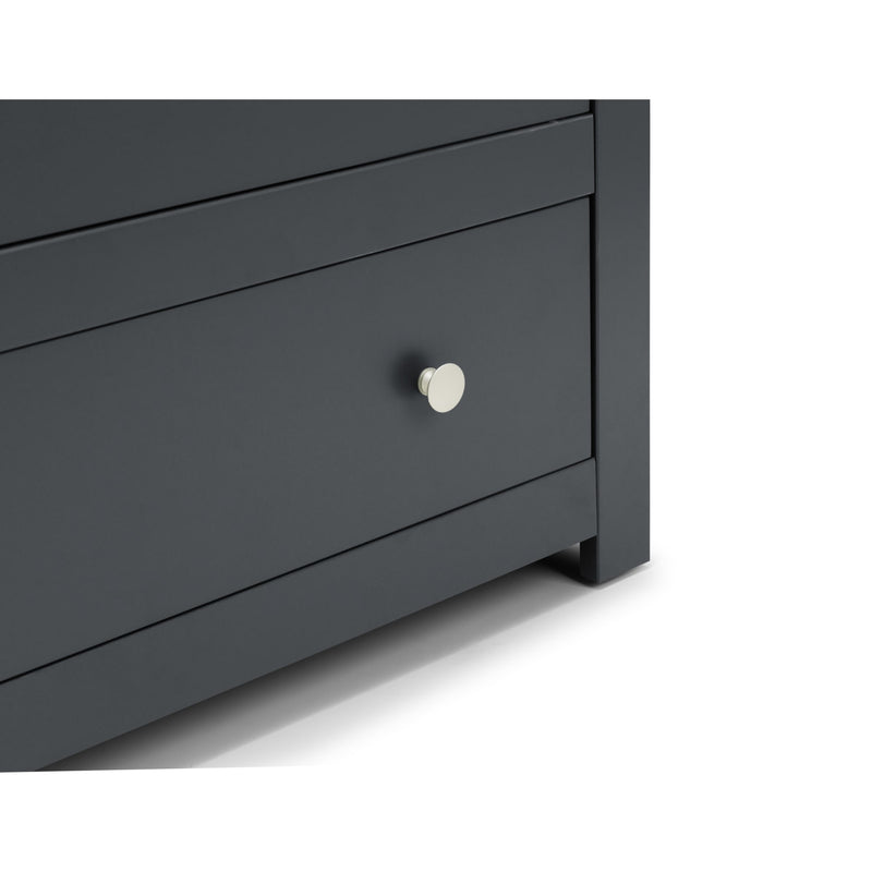 Dark gray dresser with a white knob on a white background