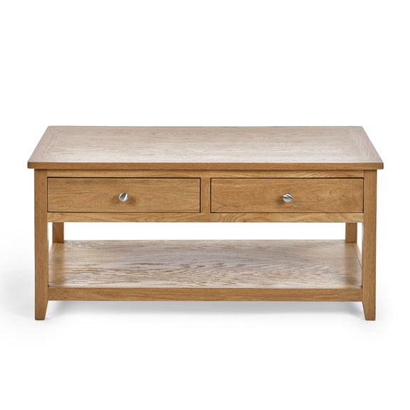 Wooden coffee table with two drawers on a white background