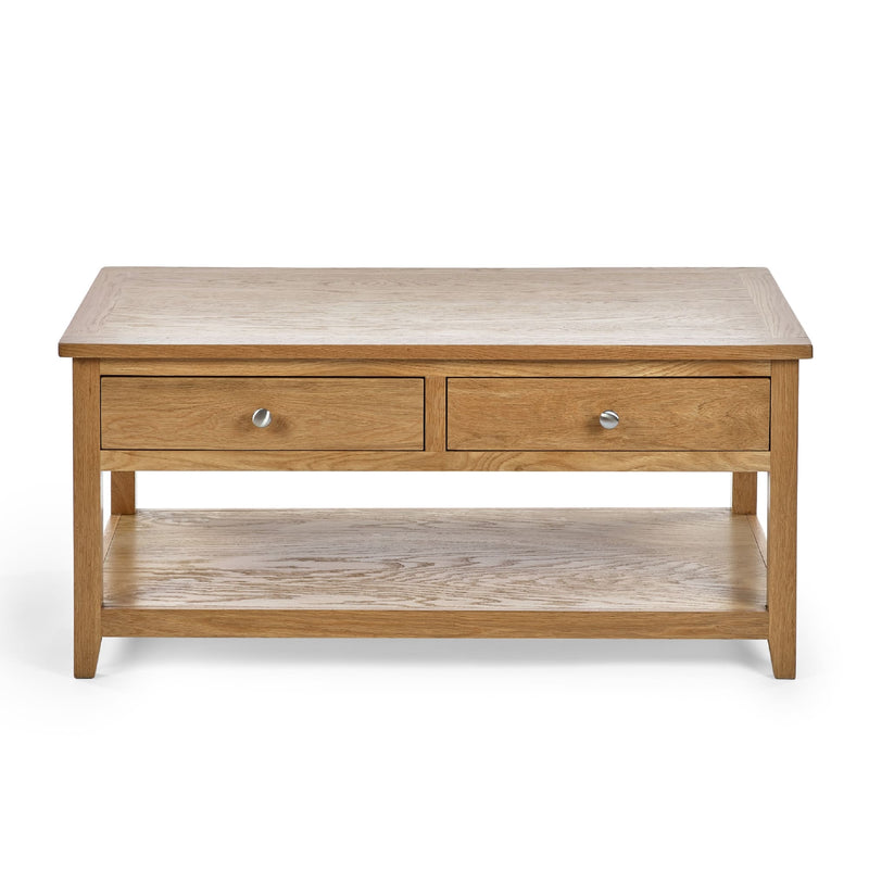 Wooden coffee table with two drawers on a white background