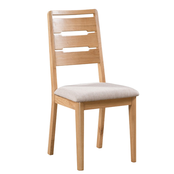 Wooden chair with a beige cushion on a white background